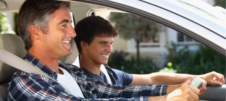 The Ultimate List of Dad Car Jokes. Dad telling car jokes while driving with his son.