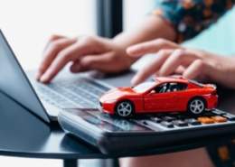 Online car loan pre-qualification with calculator and toy car.
